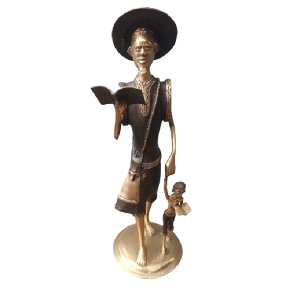 Sculpture Depicts An Adult Reading a Book